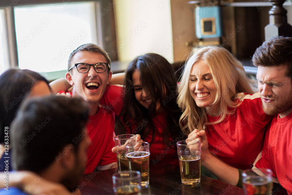 football fans or friends with beer at sport bar football fans or friends with beer at sport bar