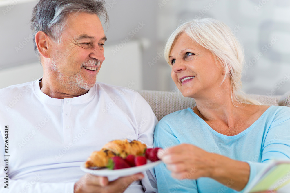 Senior couple lying in bed together
Senior couple lying in bed together