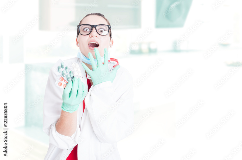 Woman medic holding many capsules Woman medic holding many capsules