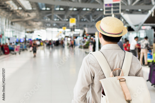man backpacker at airport. traveler concept.