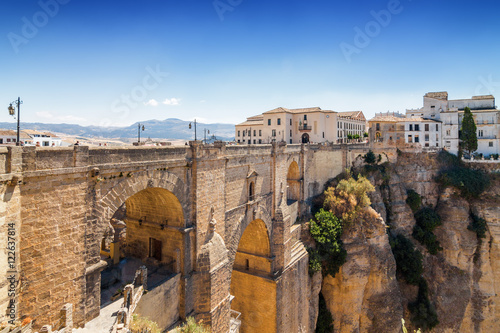 Puente Nuevo and buildings on the cliffside of El Tajo Gorge in Ronda, Malaga province, Spain.