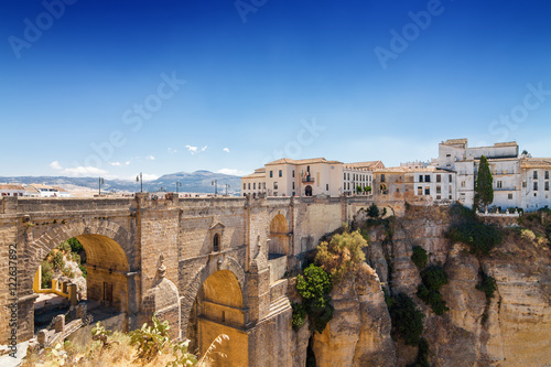 Puente Nuevo and buildings on the cliffside of El Tajo Gorge in Ronda, Malaga province, Spain.