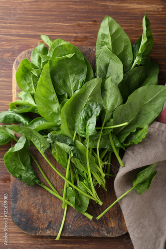 Fresh spinach on old wood