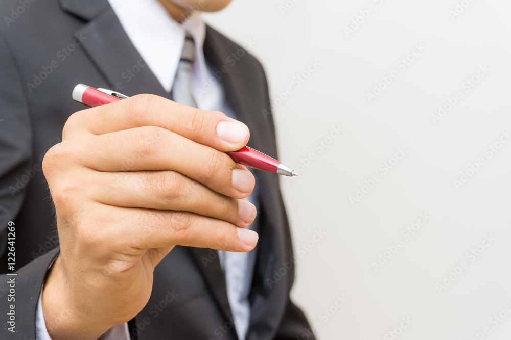 Hand of business asian man write on white background Hand of business asian man write on white background