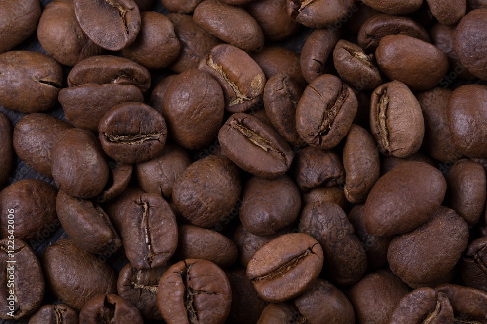 Naklejka premium coffee beans close-up. background