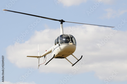 Light helicopter in flight