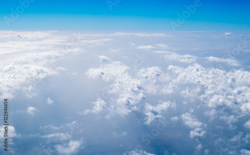 Aerial view of cloud and sky from airplane,Traveling concept