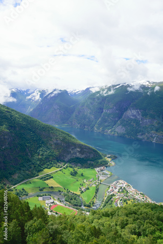 Village at the foot of the hill near the shores of the fjord © v4venger