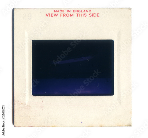 London, England, 06/06/2016 Vintage Slide film mount isolated on a white background