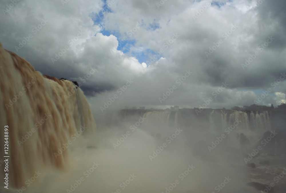 Water raging down at the Iguazu river at Iguazu Falls Brazilian side Water raging down at the Iguazu river at Iguazu Falls Brazilian side