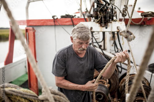 Commercial fisherman at work photo