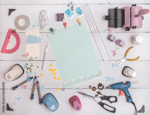 top view of the table with tools for scrapbooking