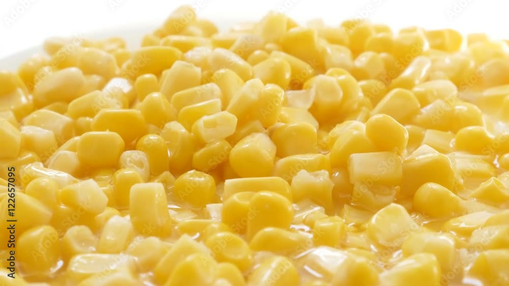 Corn kernels from the can on plate close-up 4K 2160p 30fps UHD footage - Vegetable sweet maize Zea mays healthy food background 3840X2160 UltraHD video Corn kernels from the can on plate close-up 4K 2160p 30fps UHD footage - Vegetable sweet maize Zea mays healthy food background 3840X2160 UltraHD video