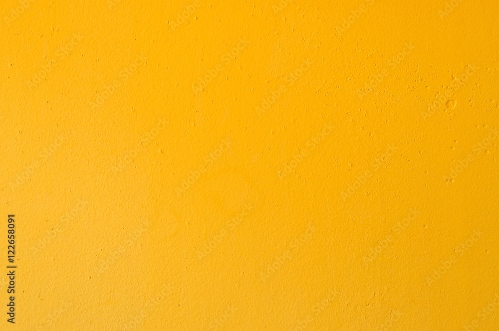 Yellow grunge cement wall for texture background Yellow grunge cement wall for texture background