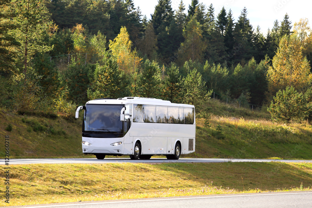 White Coach Bus Travel in Autumn