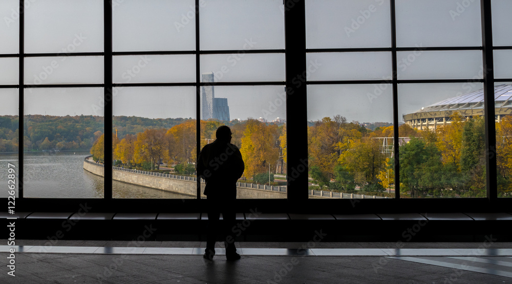 Fototapeta premium View of autumn Moscow through the panoramic windows of Vorobyovy Gory metro station
