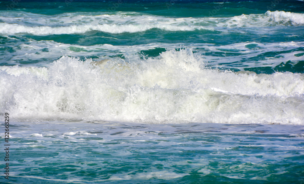 Blue and Green White Water Ocean Waves Breaking At The Beach
