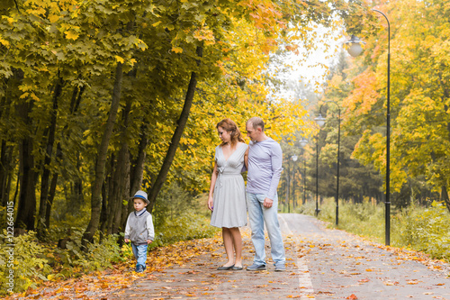 Happy family walking in autumn park © satura_