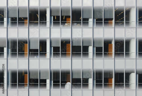 Close up of glass fronted office building