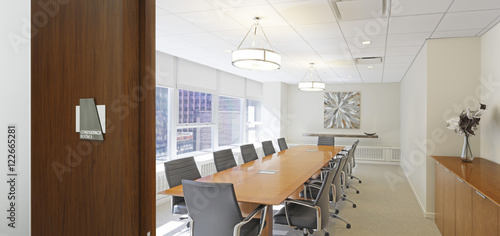 Table and chairs in empty conference room