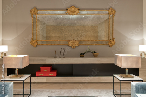 Lounge with golden gilded mirror