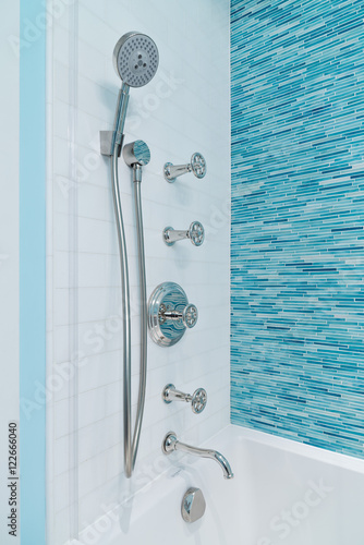 Shower fixtures in bathroom 