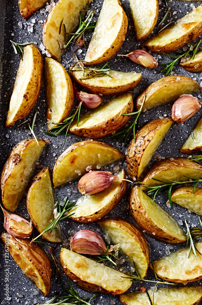 Ovenroasted potatoes with rosemary and garlic Stock Photo Adobe Stock