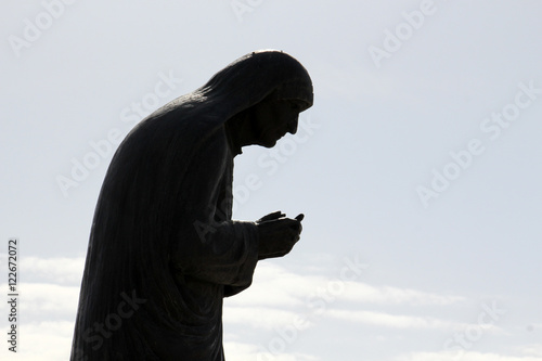 Vászonkép Silhouete of a Statue of Mother Teresa in City of Struga, Ohrid Lake, Macedonia