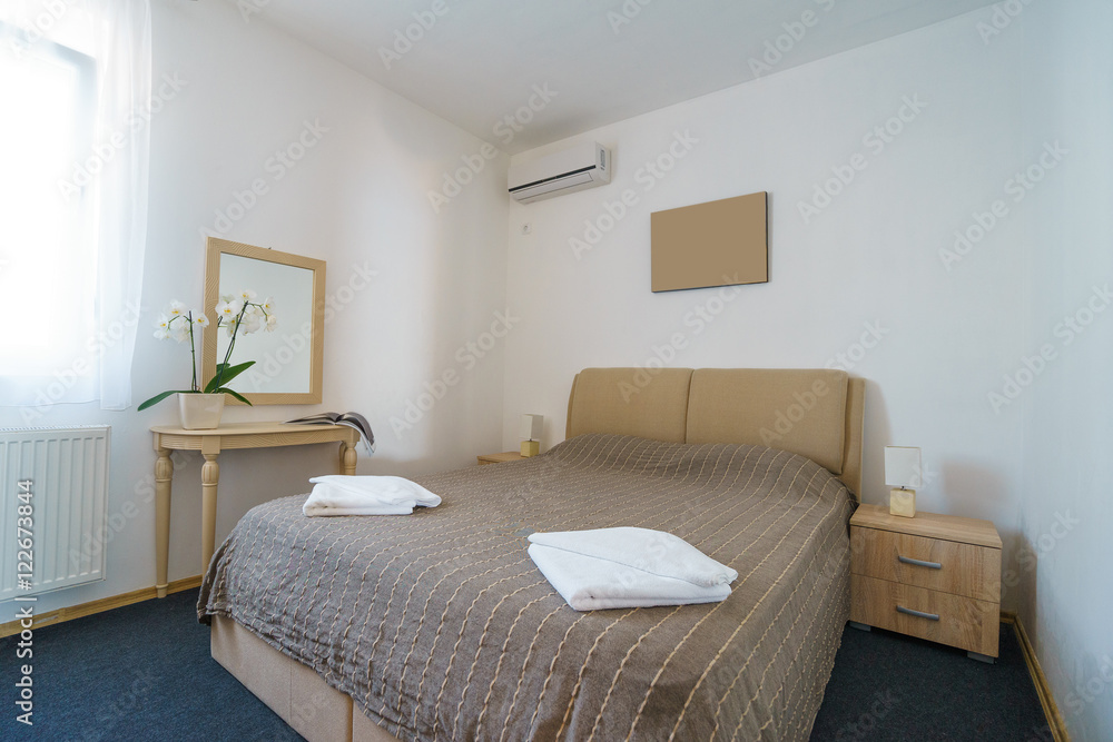 Fototapeta premium Interior of a bedroom in a villa