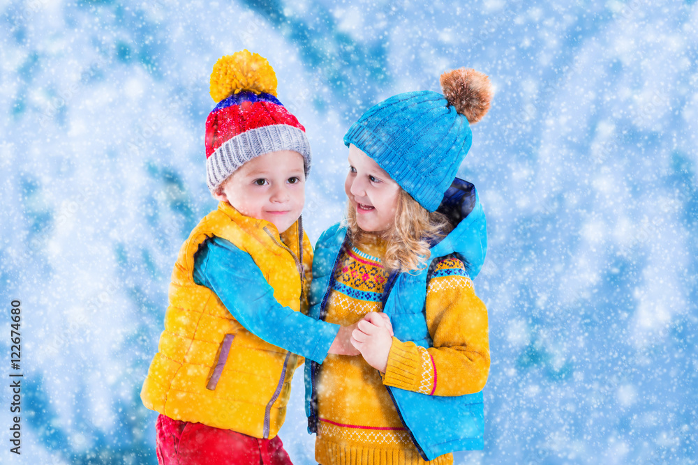 Kids playing outdoors in winter Kids playing outdoors in winter