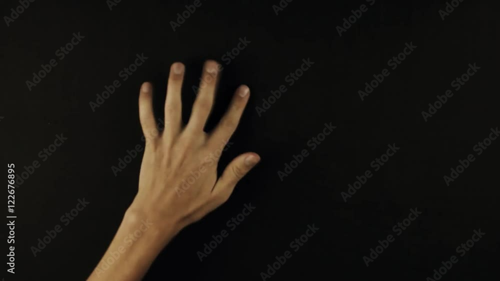 Male hands takes pumpkin off the black surface POV Male hands takes pumpkin off the black surface POV