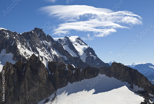 Panoramic view of Western alps whit Giant s Tooth  Dent du Geant  from Helbronner roof of europe in Aosta Valley region of Italy.