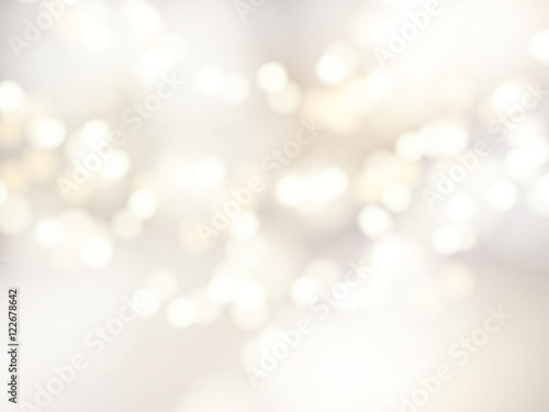 Vector bokeh background. Festive defocused white lights. Abstract blurred illustration. photo