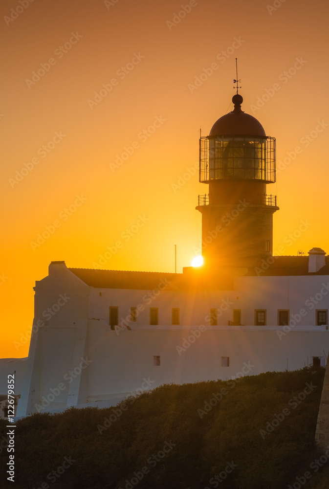 Sunset and a view of the lighthouse at Cape St. Vincent. Portugal. Region Algarve