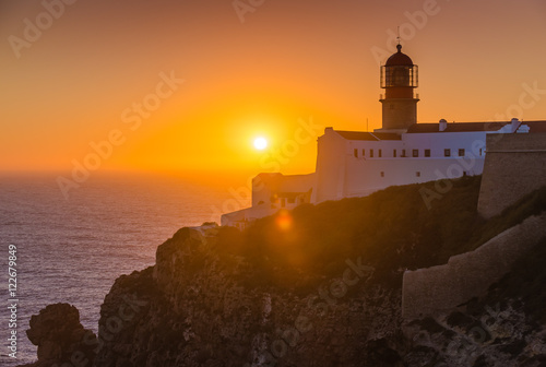 Sunset and a view of the lighthouse at Cape St. Vincent. Portugal. Region Algarve