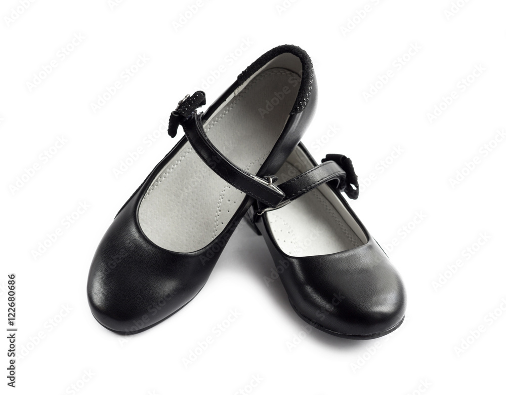 Pair of black shoes for girl on white background Pair of black shoes for girl on white background