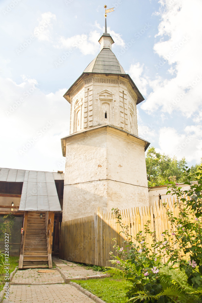 tower in the park of an ancient monastery