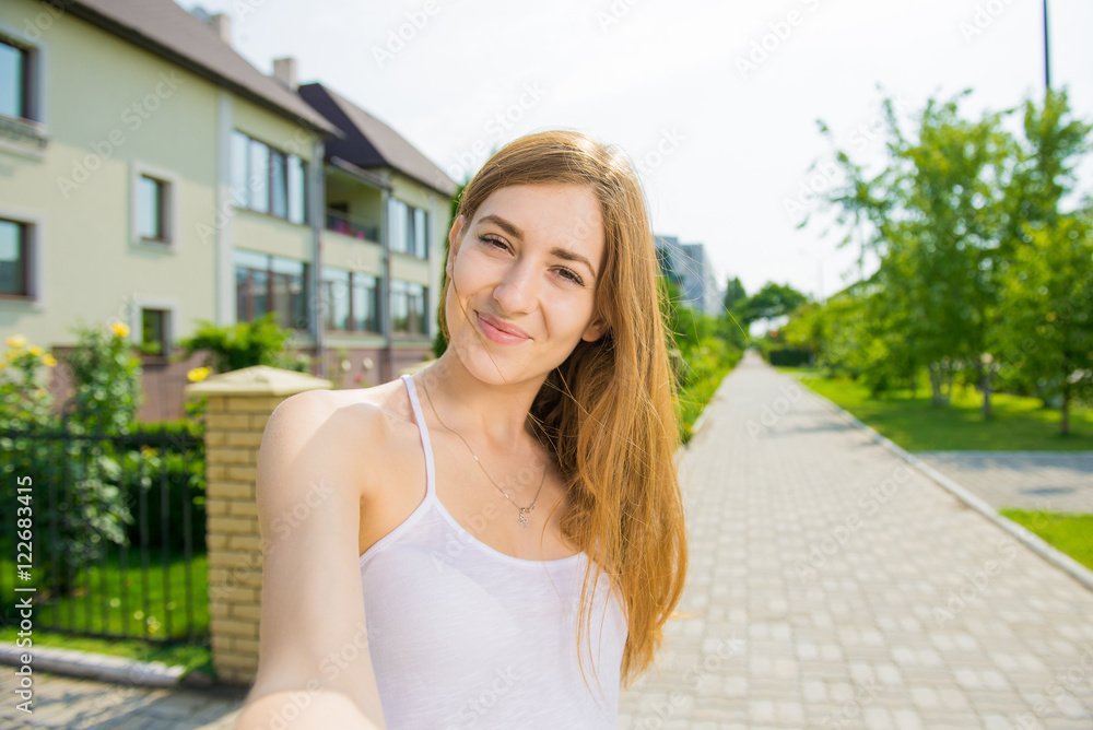 Beautiful woman tourist walking in the city. Travel Concept

