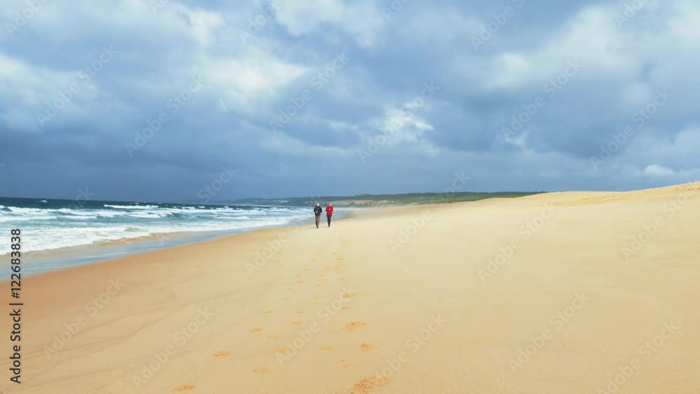 Middle-aged Couple Jogging on Ocean Sandy Beach
Middle-aged Couple Jogging on Ocean Sandy Beach