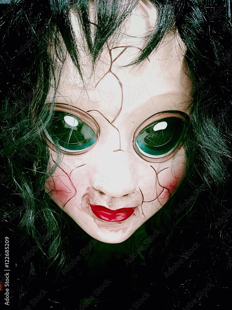 Foto de creepy scary doll with camera lens eyes do Stock Adobe Stock