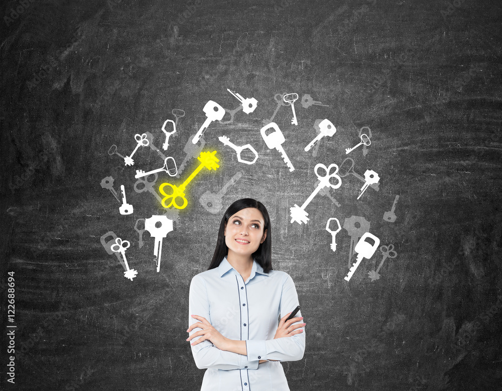 Girl with black hair near blackboard with key icon Girl with black hair near blackboard with key icon