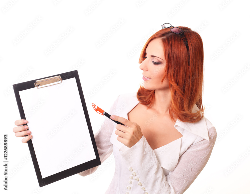 To view of smiling business woman writing in clipboard To view of smiling business woman writing in clipboard