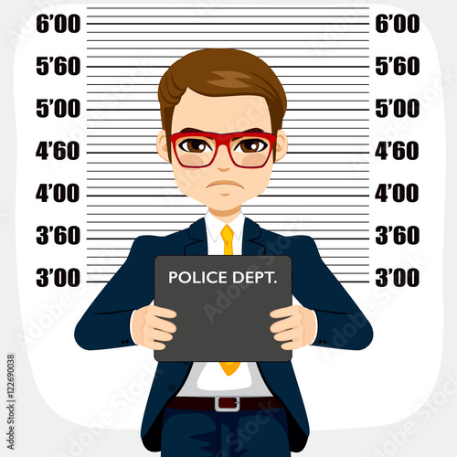 Young criminal arrested businessman holding placard for mugshot