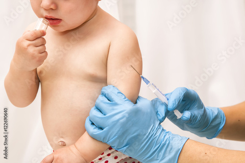 doctor vaccinating baby