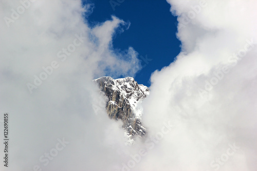 Snow covered mountains in white clouds, Caucasus, Georgia