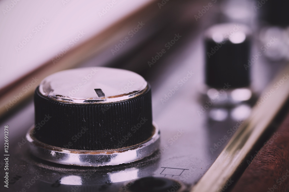 Close up of dials on a retro style radio Vintage Retro Filter. Close up of dials on a retro style radio Vintage Retro Filter.