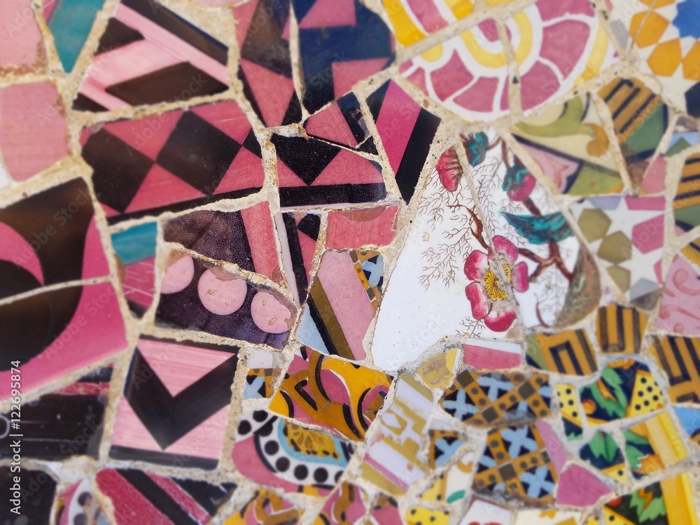 Travel Destination, Barcelona, Spain: Detail of Antonio Gaudi's mosaic art in public art landmark, Park Guell - obrazy, fototapety, plakaty 