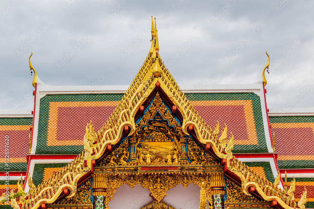 Fototapeta premium Thai art on roof Church at phathat Cheung choom woravihan temple