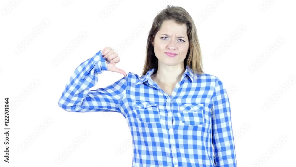 Thumbs Down By Beautiful Young Woman, White Background Thumbs Down By Beautiful Young Woman, White Background