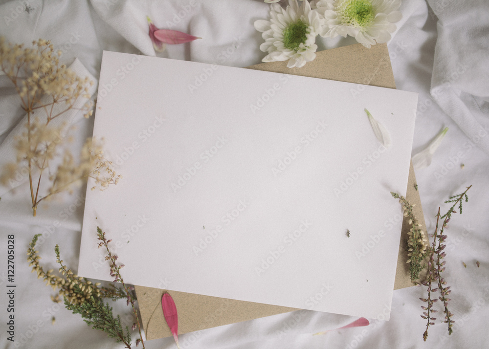 Blank white card with flowers Blank white card with flowers